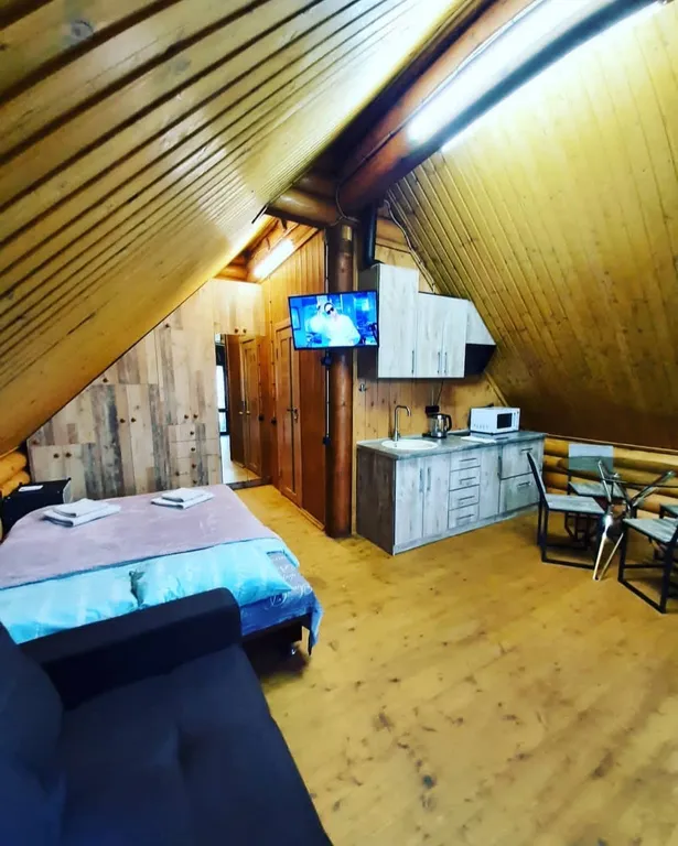 Квартира Мансардная квартира-студия в доме из сруба — Севастополь