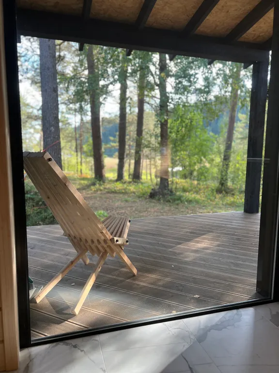 Стильный дом на берегу Ладожского озера с панорамным видом