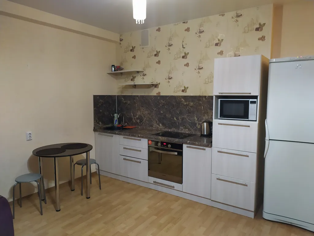 Уютная студия на высоте птичьего полета