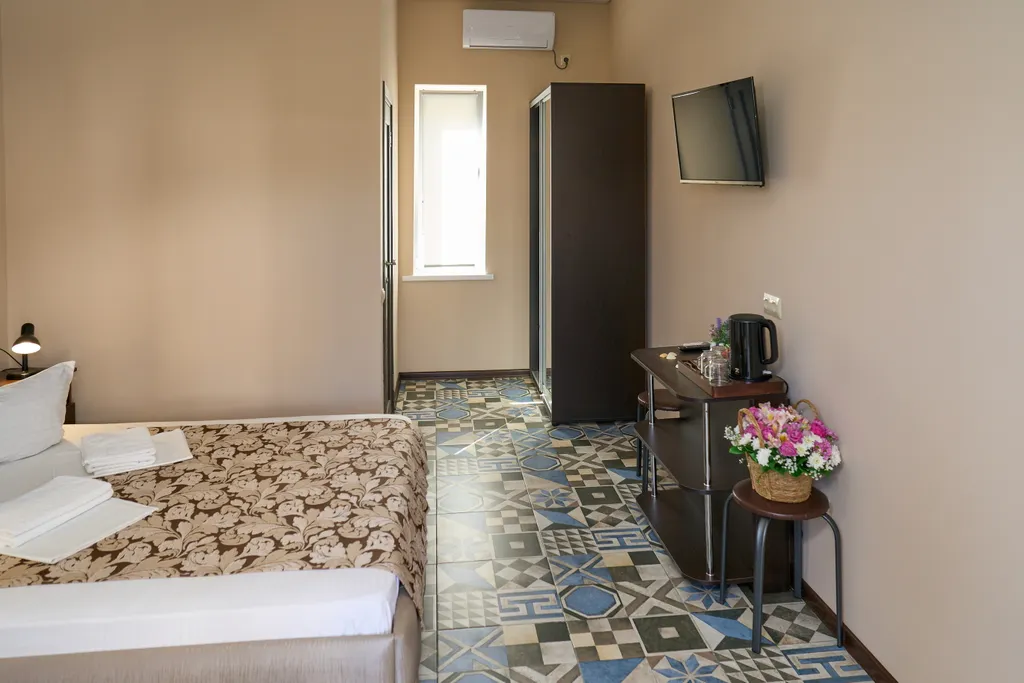 Квартира Квартира Трёхместный номер комфортный с 1 двуспальной кроватью и 1 односпальной — Кучугуры