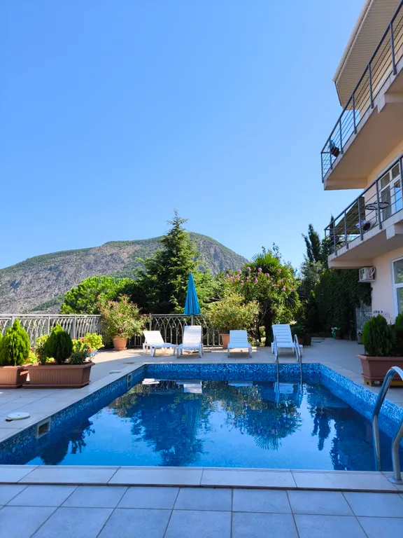 Апартаменты с видом на море и бассейн