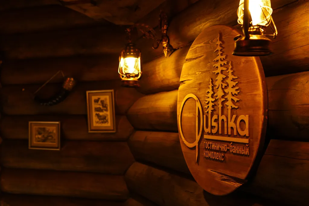 Бревенчатый дом-баня в стиле охотничьего домика