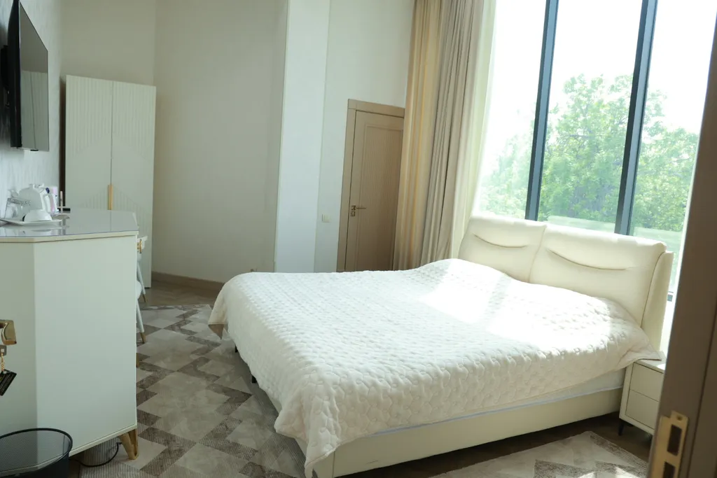 Квартира Номер с кроватью размера king-size и видом на сад — аренда посуточно в Ташкент