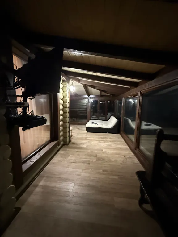 Двухэтажный дом из сруба а Теберде с баней с видом на горы и реку