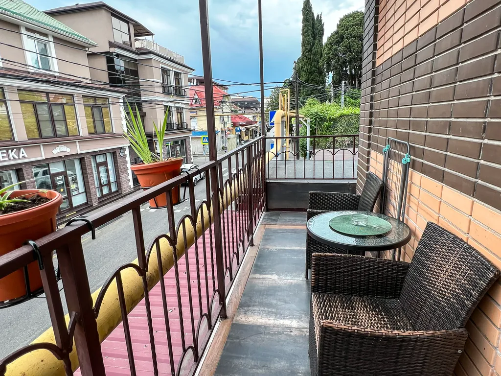 Семейный номер с кухней в центре