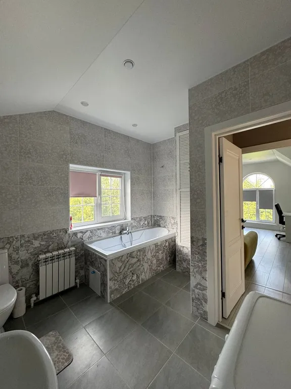 Уютный дом с панорамными окнами