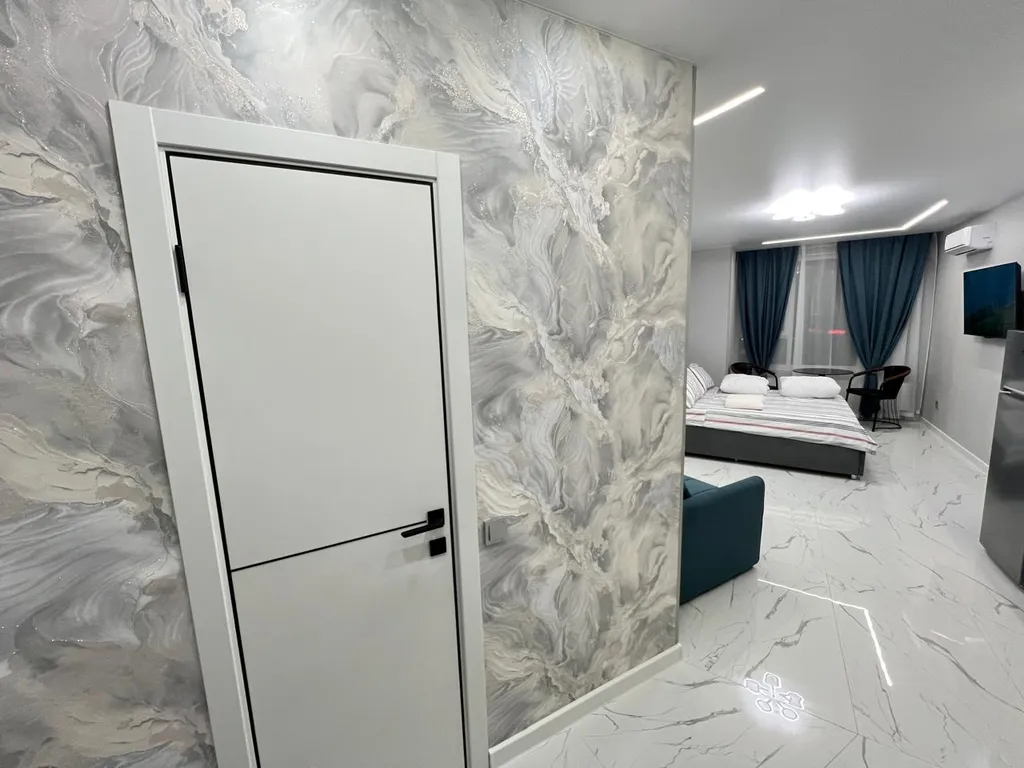 Прекрасная студия с видом на реку и город