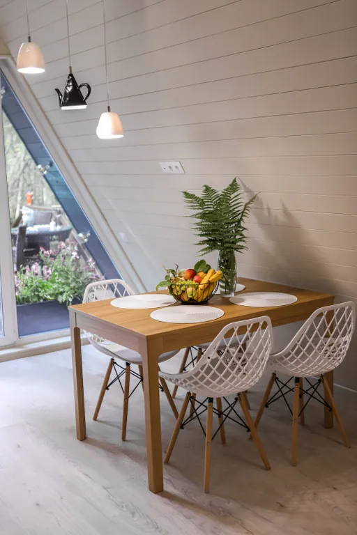 Нескучный треугольный дом Mökki с купелью