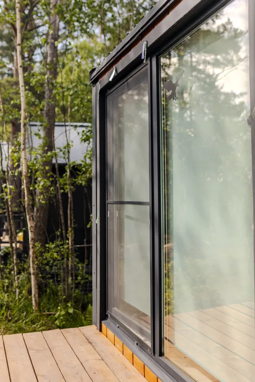 Дом-студия с панорамной стеной на залив Мусталанлахти