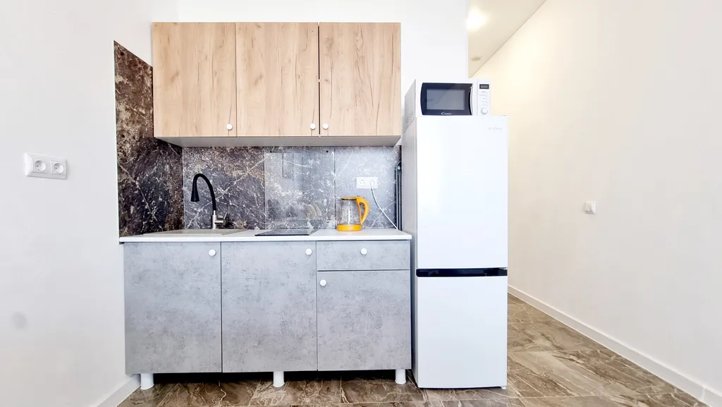 Светлая студия на высоком этаже