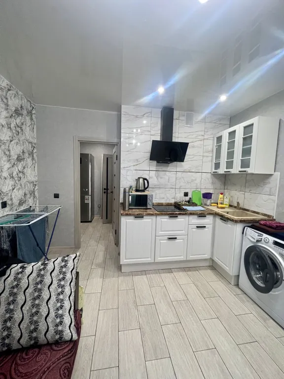 Двухкомнатная квартира с кухней-гостиной