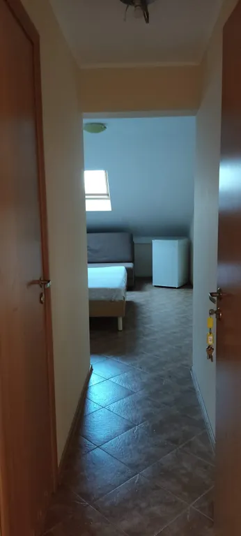 Трехместный номер с удобствами в мансарде