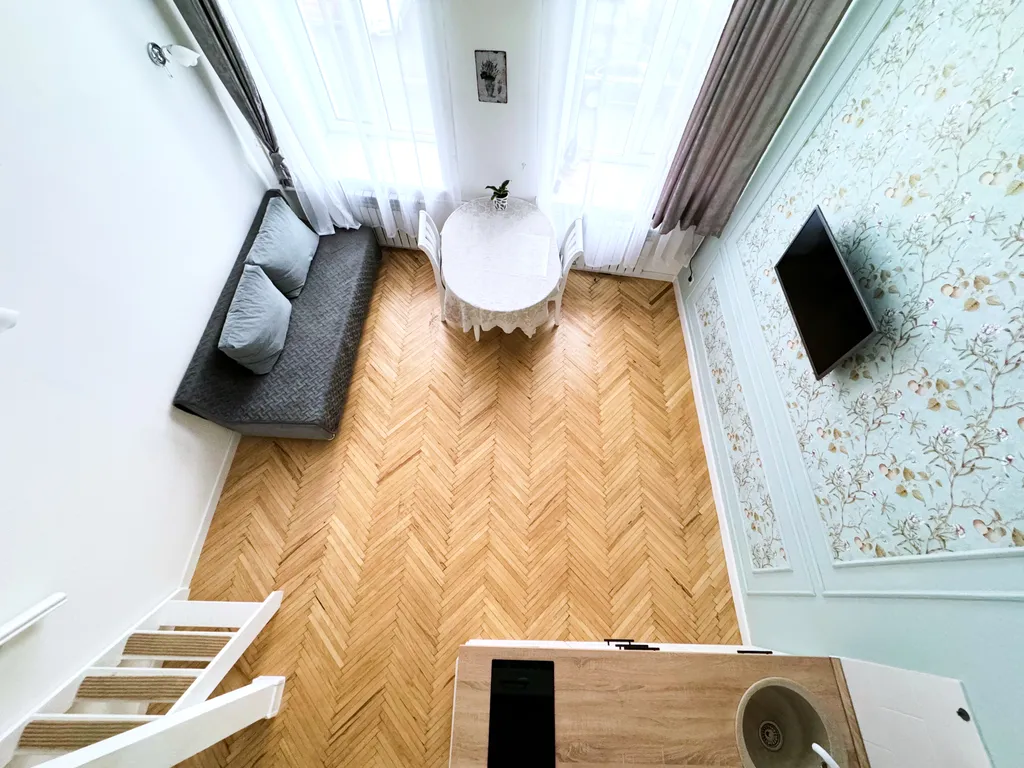 Удобная двухуровневая квартира в центре