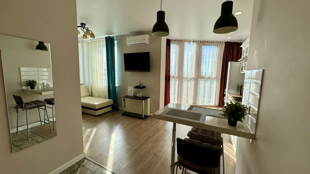 Апартамент с панорамным видом на Волгу и город