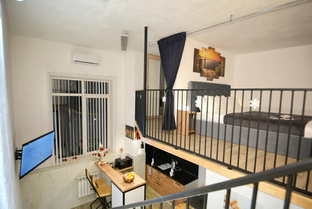 Квартира Комфортный двухуровневый апартамент в элитном комплексе Колизей — аренда посуточно в Коломна