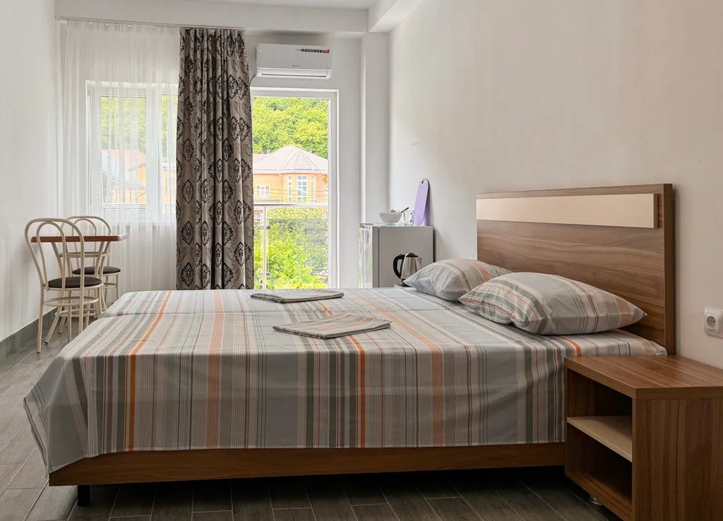 Двухкомнатный четырехместный номер с балконами