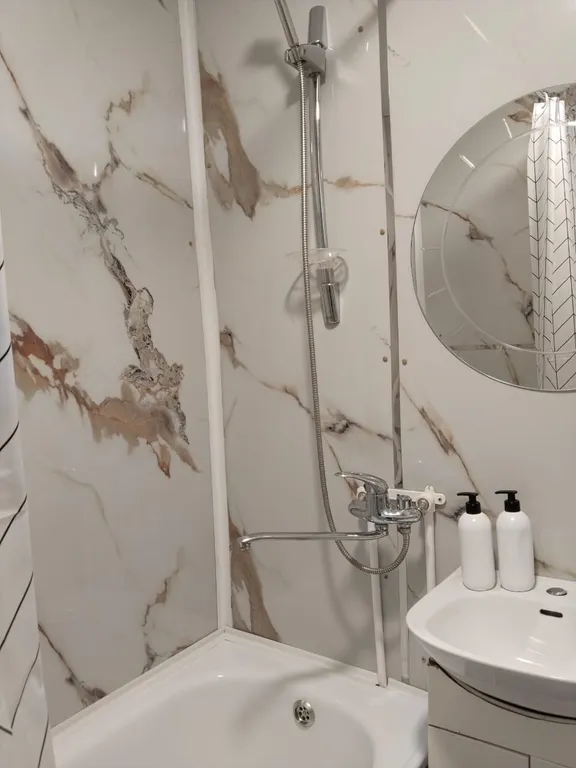 Квартира с видом на ели