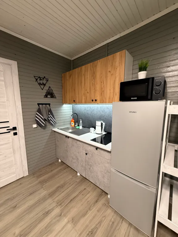 Квартира Уютная комната для четверых в деревянном таунхаусе у озера — Мезмай