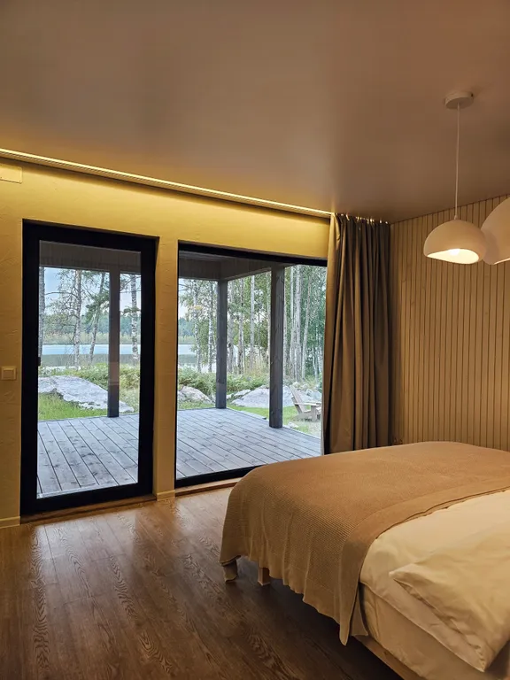 Вилла Nelli с видом на озеро и зоной барбекю среди каменной россыпи