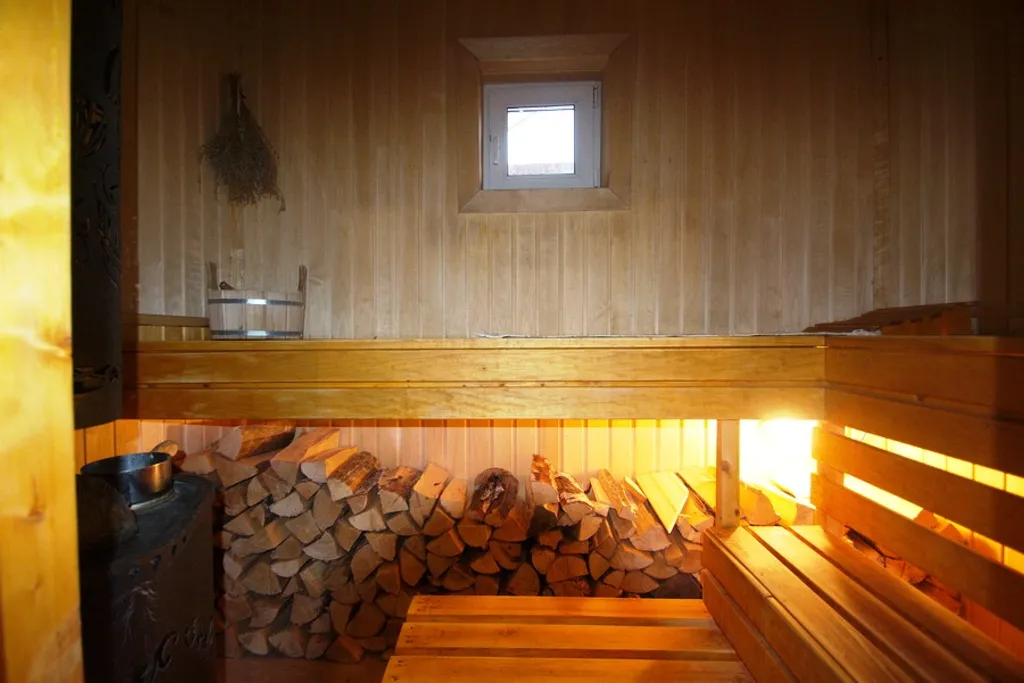 Стильный коттедж с баней и купелью