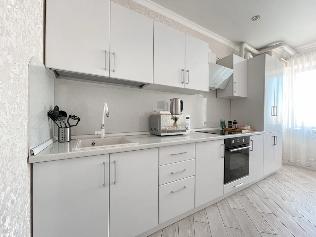 Современная квартира с видом на реку Кутум