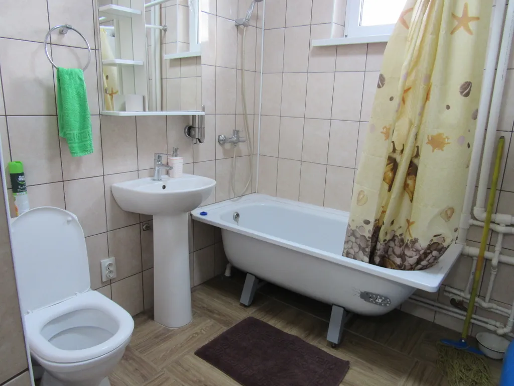 Уютный номер со светлой кухней и беседкой