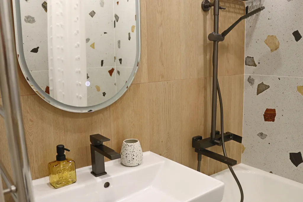 Уютная трехкомнатная квартира с дизайнерским ремонтом