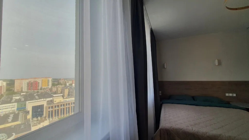 Уютная дизайнерская квартира с прекрасным видом из окна