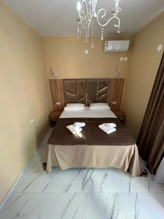 Двухкомнатные апартаменты с видом на горы и мини - диванчиком