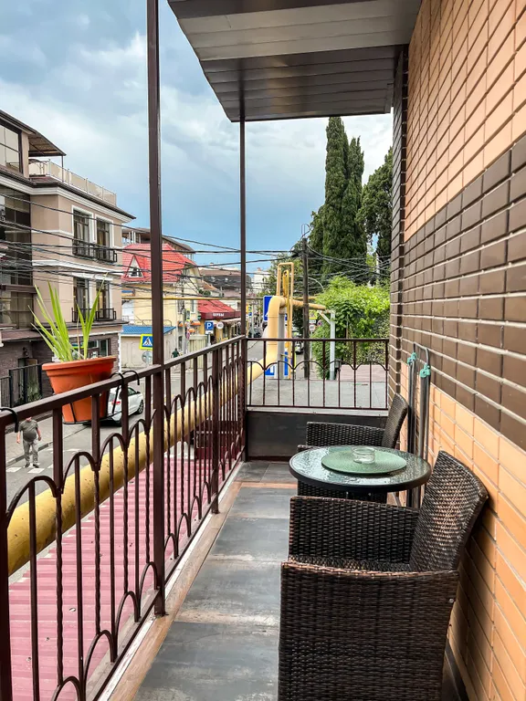 Семейный номер с кухней в центре